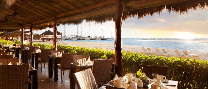 El Dorado Maroma includes fine dining and beach side surf and turf