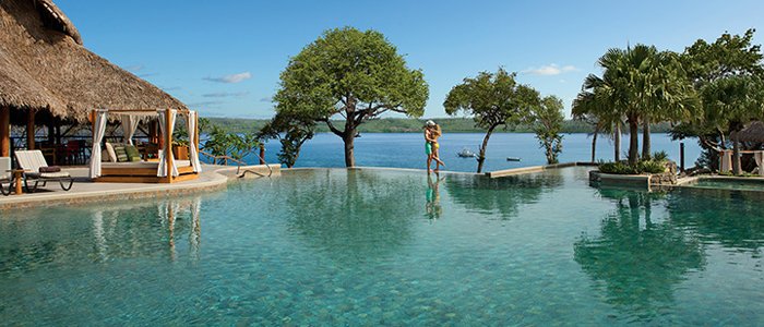 Secrets Papagayo Costa Rica includes stunning ocean views and poolside service for your honeymoon