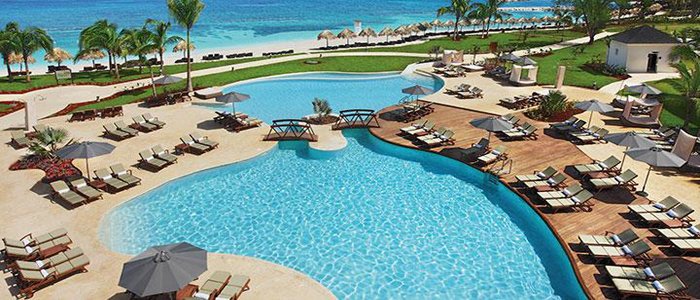 Secrets St James includes beautiful pools with views of the ocean