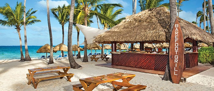 Hang out at the beach bar cabana at Dreams Palm Beach Punta Cana